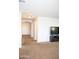 Spacious bonus room with plush carpeting, modern entertainment setup, and ample natural light at 15148 W Sells Dr, Goodyear, AZ 85395