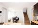 Bright dining room adjacent to the kitchen and stairs for easy access at 15148 W Sells Dr, Goodyear, AZ 85395