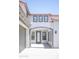 Inviting entrance and well-lit with an arched entryway and neutral tones at 15148 W Sells Dr, Goodyear, AZ 85395