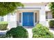 Inviting entrance showcasing a double door and manicured shrubbery at 15148 W Sells Dr, Goodyear, AZ 85395