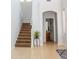 Bright foyer featuring a staircase, leading to upper level at 15148 W Sells Dr, Goodyear, AZ 85395