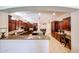 Well-appointed kitchen with dark wood cabinets, granite countertops, and modern appliances at 17975 W Willow Dr, Goodyear, AZ 85338