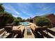 Poolside seating area, perfect for lounging by the pool at 17975 W Willow Dr, Goodyear, AZ 85338