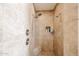 Updated shower with dual shower heads, seat, and tiled niche at 17975 W Willow Dr, Goodyear, AZ 85338