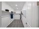 Walk-in closet providing ample storage with built-in shelving and organized hanging space at 18134 W Creedance Blvd, Surprise, AZ 85387
