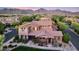 Beautiful aerial view of a sprawling two-story house in a serene neighborhood at 18562 N 94Th St, Scottsdale, AZ 85255
