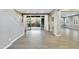 Bright and spacious living area with a staircase and sliding glass doors leading to the outdoor space at 18562 N 94Th St, Scottsdale, AZ 85255