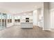 Modern living space featuring sleek countertops, stainless steel appliances, and an open layout filled with natural light at 18931 W Crescent Way, Buckeye, AZ 85326