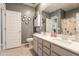 Bathroom featuring a double sink vanity, ample storage, and a neutral color scheme at 20251 W Madison St, Buckeye, AZ 85326