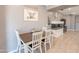 Cozy dining area featuring a table with seating, complemented by stylish decor for delightful meals at 20251 W Madison St, Buckeye, AZ 85326