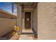 Charming front door area with decorative sunflowers and a welcoming 'Hey Friends' sign at 20251 W Madison St, Buckeye, AZ 85326