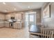Bright and airy kitchen adjacent to dining, featuring modern appliances and a seamless flow for entertaining at 20251 W Madison St, Buckeye, AZ 85326