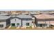Beautiful view of a residential area featuring modern homes and well-maintained landscaping at 21047 N 58Th Way, Phoenix, AZ 85054