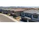 Overhead view highlighting the community's well-designed homes, ample parking, and desert landscape at 21047 N 58Th Way, Phoenix, AZ 85054