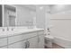 Bathroom featuring a double sink vanity, white countertop, cabinets, and tile flooring at 21047 N 58Th Way, Phoenix, AZ 85054