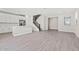 Bright living room with open floor plan to kitchen and staircase at 21047 N 58Th Way, Phoenix, AZ 85054