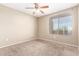 Neutral bedroom with carpet and a large window with plenty of natural light at 2134 E Broadway Rd # 2030, Tempe, AZ 85282