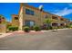 Attractive condo building featuring a stucco exterior and well-maintained landscaping at 2134 E Broadway Rd # 2030, Tempe, AZ 85282