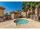 Relaxing hot tub area surrounded by lush greenery and well-maintained building at 2134 E Broadway Rd # 2030, Tempe, AZ 85282