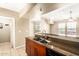 Bright kitchen features granite countertops, stainless steel sink, and updated cabinetry at 2134 E Broadway Rd # 2030, Tempe, AZ 85282