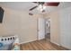 Bright, airy bedroom featuring wood laminate floors and neutral paint scheme at 2256 S Las Flores --, Mesa, AZ 85202