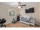 Cozy bedroom with crib, window, and playful decor at 2256 S Las Flores --, Mesa, AZ 85202