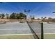 Well-maintained tennis court with new net and benches, ideal for sports enthusiasts at 2256 S Las Flores --, Mesa, AZ 85202