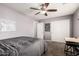 Bedroom with a large closet, ceiling fan and space for a desk at 25420 W Park Ave, Buckeye, AZ 85326