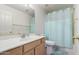 Bathroom featuring tub and shower combination with simple vanity and fixtures at 2615 N 123Rd Dr, Avondale, AZ 85392