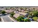 A cozy home in a Gathering-friendly neighborhood featuring a private pool, grassy backyard, and desert landscaping at 2615 N 123Rd Dr, Avondale, AZ 85392