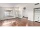 Bright living room with hardwood floors, large window, and plenty of natural light. Perfect for relaxing or entertaining at 2615 N 123Rd Dr, Avondale, AZ 85392