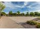 Full basketball court with well-maintained pavement in a park-like setting with trees at 2741 E Odessa St, Mesa, AZ 85213