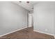 Empty bedroom with neutral walls, brown carpet, and a ceiling fan at 2741 E Odessa St, Mesa, AZ 85213