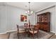 Charming dining room with stylish chandelier, rug, and accent furniture at 2741 E Odessa St, Mesa, AZ 85213