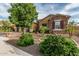 Landscaped front yard with stone accents and mature landscaping at 2741 E Odessa St, Mesa, AZ 85213