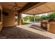 Covered patio and outdoor kitchen overlooking pool at 2741 E Odessa St, Mesa, AZ 85213
