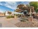 Inviting picnic area featuring shaded tables, stone accents, and landscaping; a perfect spot for outdoor gatherings at 2741 E Odessa St, Mesa, AZ 85213
