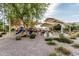 Playground area featuring slides, a picnic table, and other recreational amenities within the community at 2741 E Odessa St, Mesa, AZ 85213