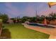 Backyard pool and patio with lush landscaping at 2741 E Odessa St, Mesa, AZ 85213