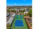 Aerial view showcasing tennis courts, community amenities, and building exteriors at 3031 N Civic Center Plz # 355, Scottsdale, AZ 85251