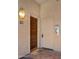Unit #355 with a welcoming front door, decorative details and a 'hello' doormat at 3031 N Civic Center Plz # 355, Scottsdale, AZ 85251