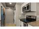 Sleek kitchen design featuring stainless steel appliances and modern hardware at 3031 N Civic Center Plz # 355, Scottsdale, AZ 85251