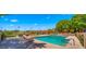 Community pool with lounge chairs, tables, and covered patio, perfect for relaxing on a sunny day at 3031 N Civic Center Plz # 355, Scottsdale, AZ 85251