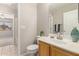 Bathroom with vanity, mirror, and adjacent bedroom entrance at 30601 N Royal Oak Way, San Tan Valley, AZ 85143