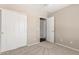 Bedroom featuring a double closet and entryway at 30601 N Royal Oak Way, San Tan Valley, AZ 85143