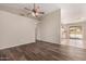 Spacious living room featuring hard wood flooring and an open layout at 30601 N Royal Oak Way, San Tan Valley, AZ 85143
