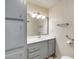 Bathroom featuring a large vanity with a mirror and brushed nickel lighting at 3307 E Kings Ave, Phoenix, AZ 85032