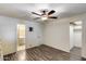 Bedroom showcasing wood-look floors with a door to the bathroom and closet at 3307 E Kings Ave, Phoenix, AZ 85032