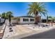Charming mobile home with well-maintained landscaping, driveway, and inviting curb appeal in a desirable community at 3307 E Kings Ave, Phoenix, AZ 85032