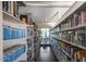 Bright and organized library with floor-to-ceiling bookshelves, offering a quiet space for reading and study at 3307 E Kings Ave, Phoenix, AZ 85032
